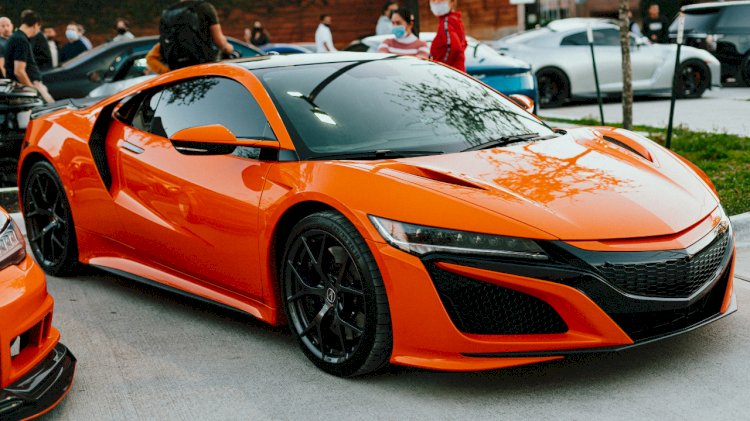 A picture of an orange NSX the latest release