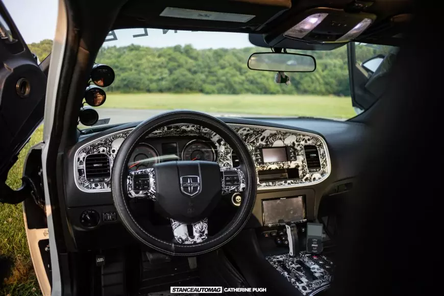 The interior of  a Modified Dodge Charger featured on stance auto magazine
