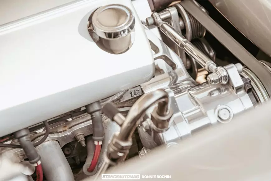close up of some engine parts on a 1955 Chevrolet Bel Air: Street Rod shot by stance auto magazine