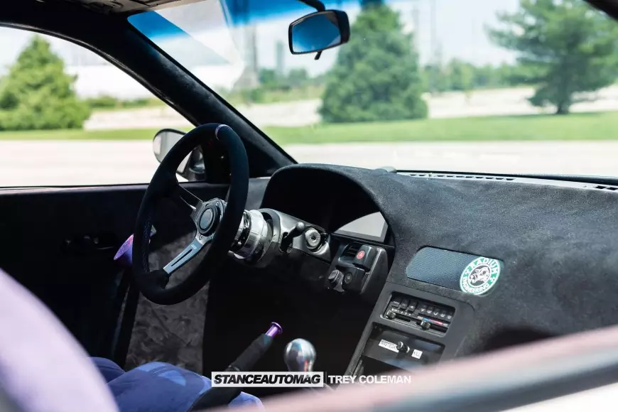The steering wheel of a 1991 Nissan 240SX shot by Stance Auto Magazine Photographers