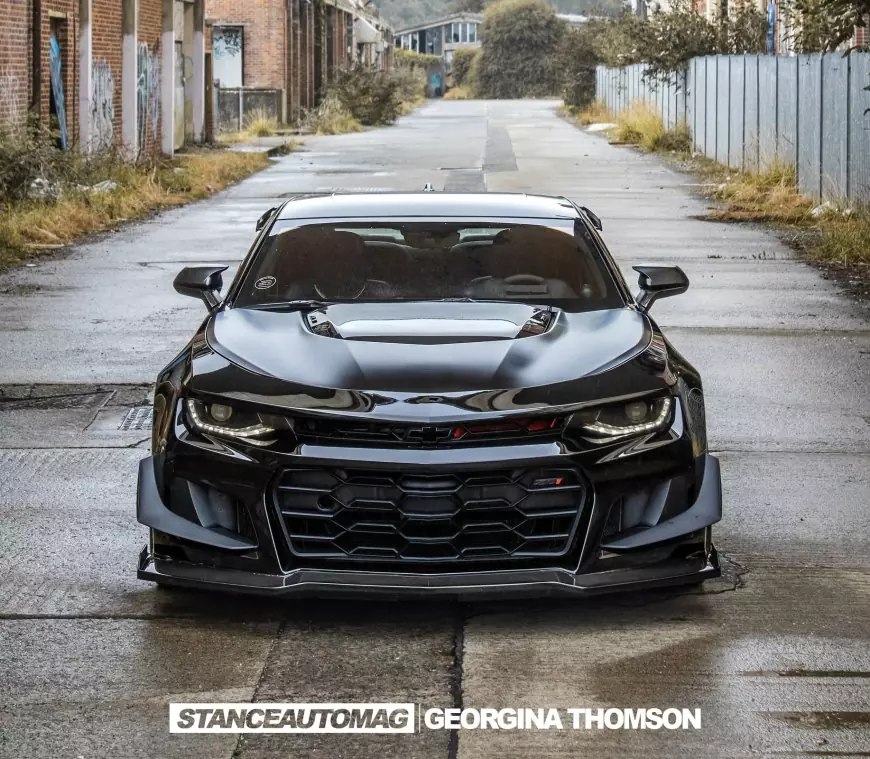 The front end of A Chevrolet Camaro ZL1 shot by Stance Auto Magazine Photographers parked on an industriel estate