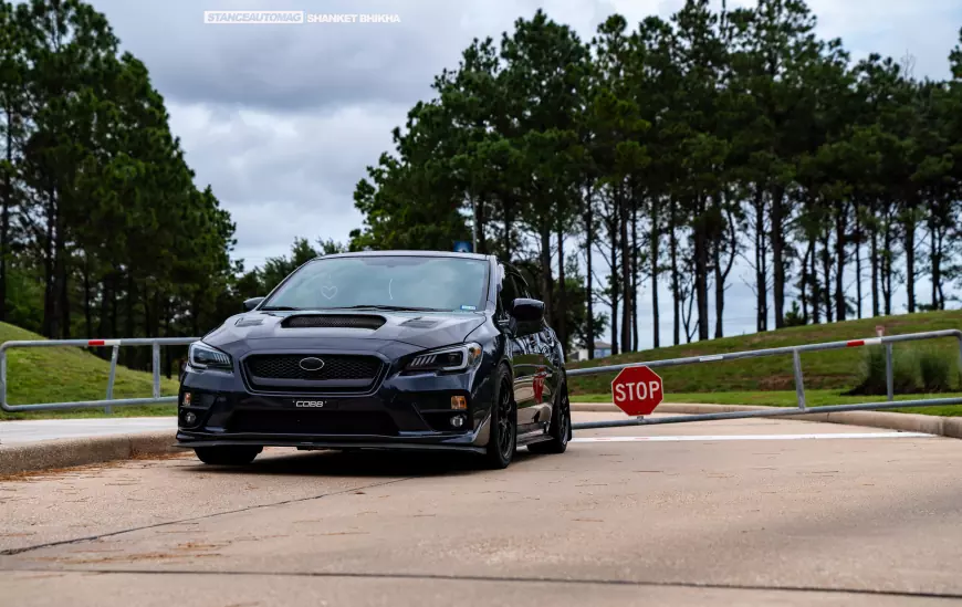 Black 2015 Subaru WRX parked on the side of the road, shot by Stance Auto Magazine Photographers