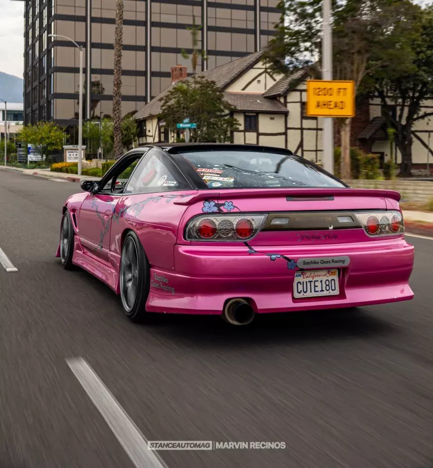 The back of a Pink 1989 Nissan 240SX