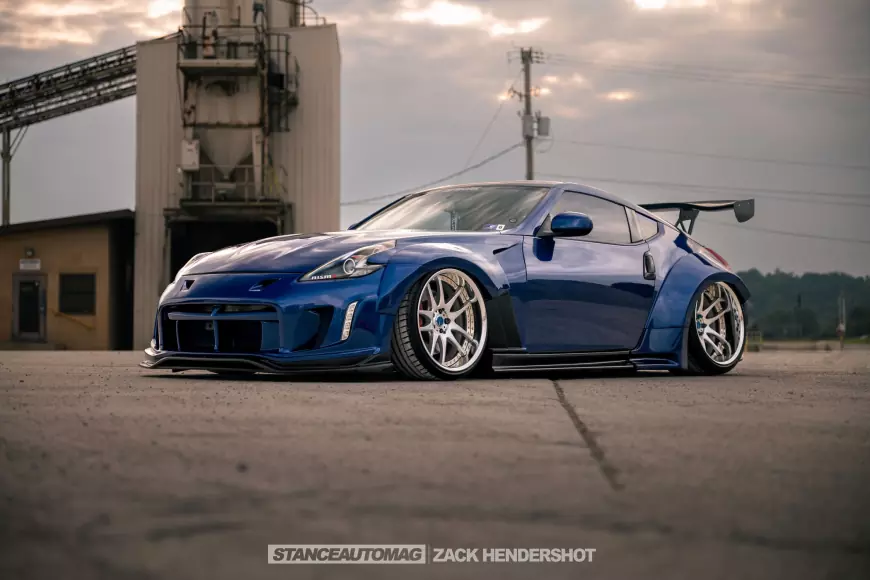 Nissan 370Z in blue with 19 inch alloys parked on the road