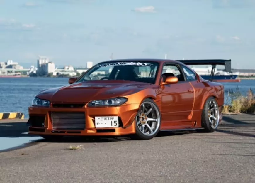An S15 with a KAZAMA wide body kit in gold