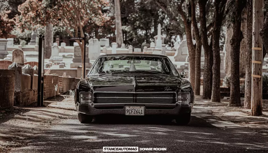 The front of a lowrider 1967 Buick Riviera 'Deathwish'  shot by stance auto magazine photogrpahers