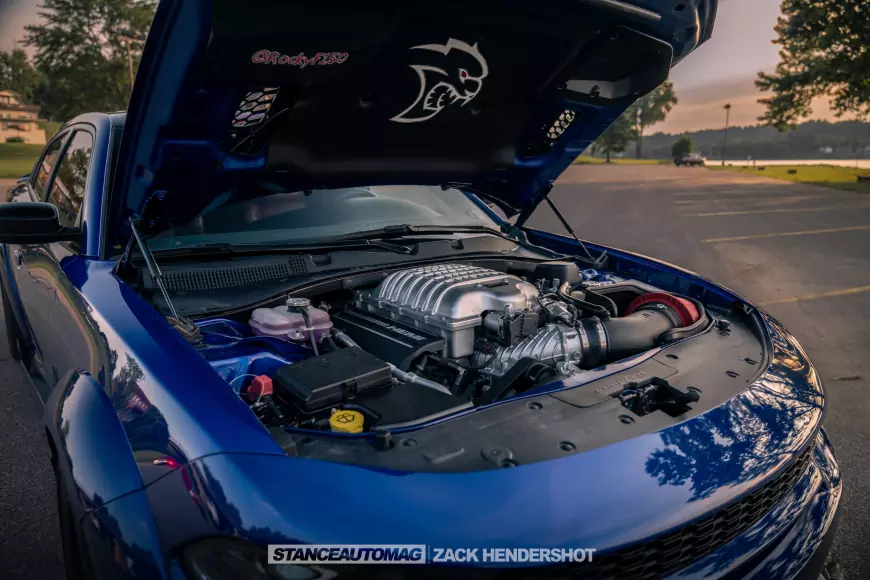 The bonnet open showing the engine bay of a 2021 Charger Hellcat Redeye Widebody shot by stance auto magazine photographers