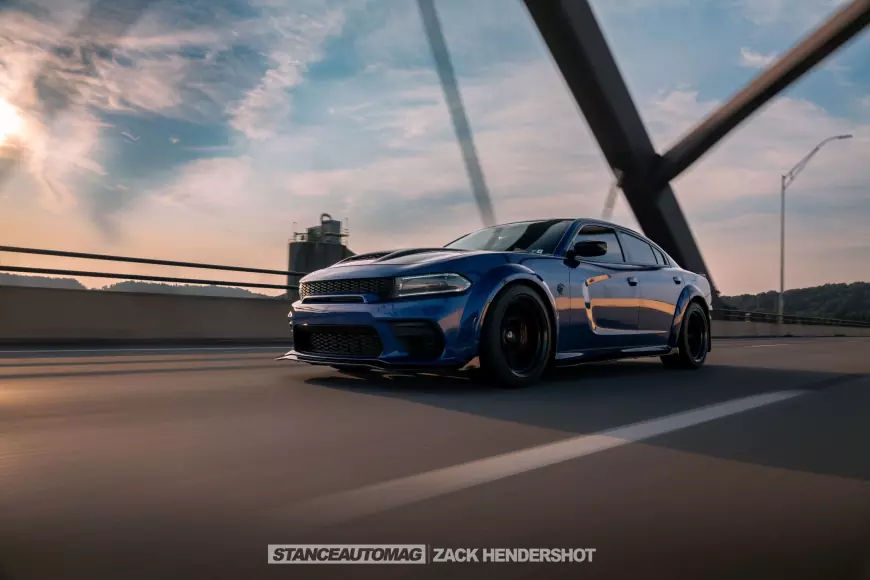 Picture of a 2021 Charger Hellcat Redeye Widebody shot by stance auto magazine photographers speeding down the highway