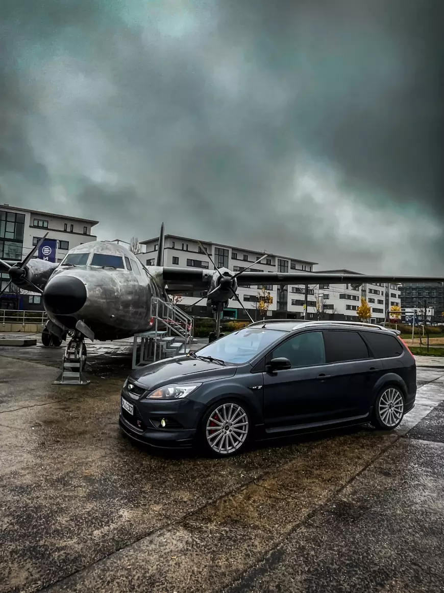 The 2009 Ford Focus Wagon S: shot next to an airoplane 