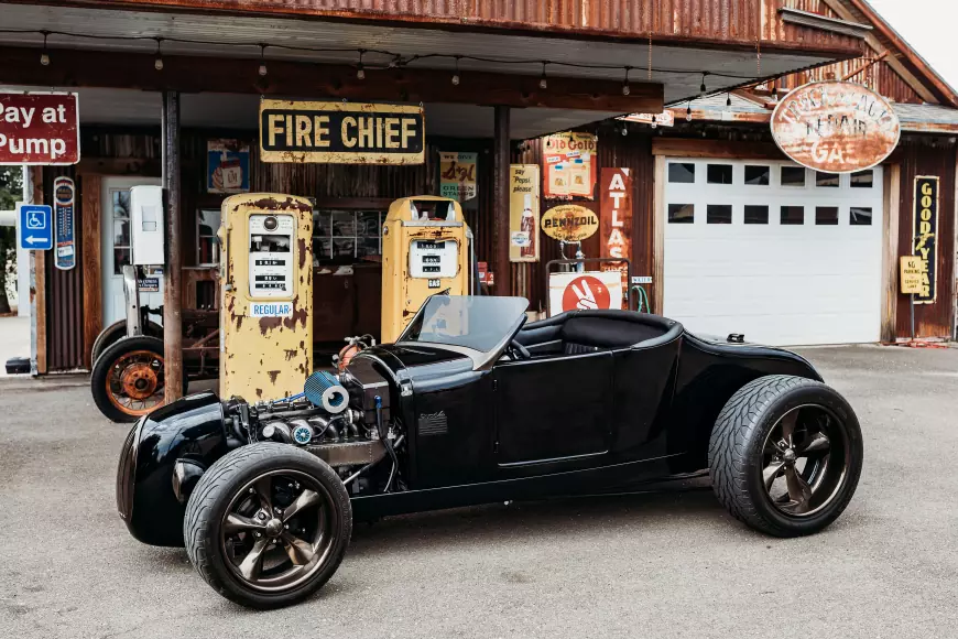 1927  Ford Track T Roadster - Black Tiger parked outside a classic old filling station