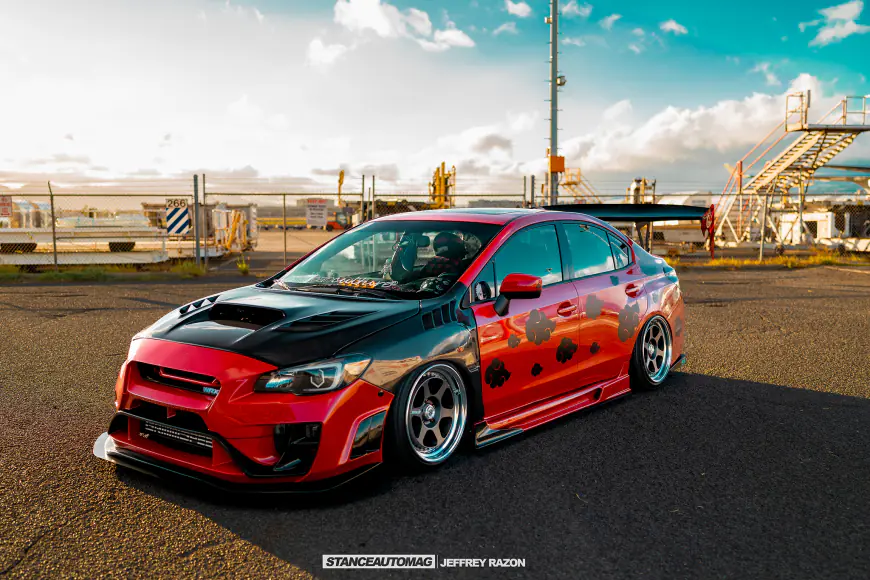 Subaru STI wrapped in Red and Black