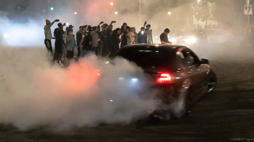 A car takeover scene at a car show
