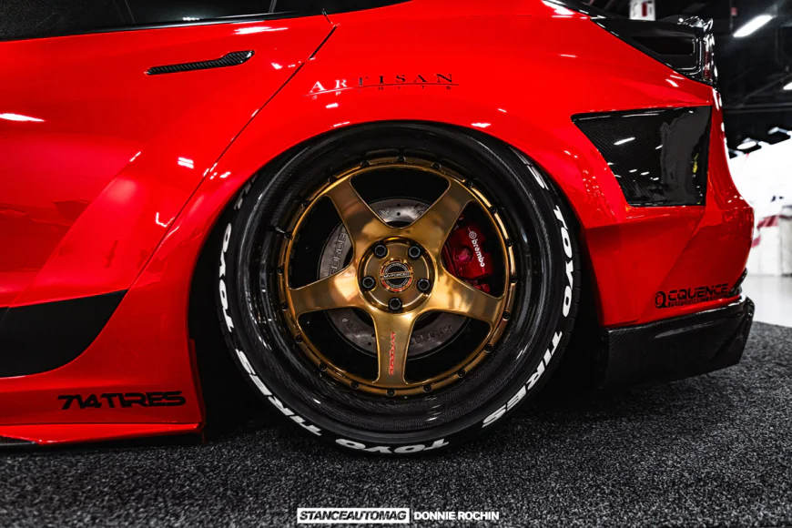 SEMA Tesla Model 3 Widebody Build with Artisan Spirits Kit and Carbon Fiber gold wheels