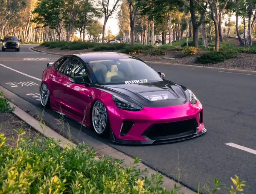 pink tesla model 3 modified and wrapped